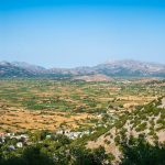 Panoramic view of Lasithi Plateau from Cave of Diktaion Andron. Amazing aerial view of famous Lasithi Plateau in Crete, Greece