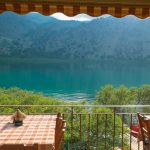 View on the lake Kournas through tavern, Crete